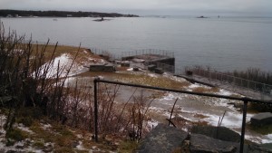 Ft McClary – First Folf 2015 – "Tee 10" overlooking Pepperrell Cove where the Piscataqua River empties into the Atlantic.  Traditionally, the hole plays down some steps and into an underground bunker but it was flooded out due to the storm.  Instead, the target was a section of fence that surrounds the staircase. Pink tape can be seen marking that section.